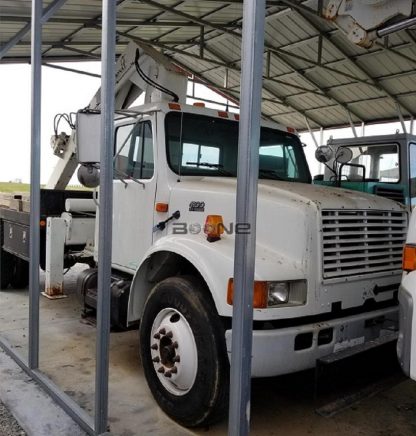 2001 INTERNATIONAL 4900DT-camion-grua-teamboone-machinery-construction-zonapesada-magazine-news-promocion-compra-venta-maquinarias-pesadas-latam-usa